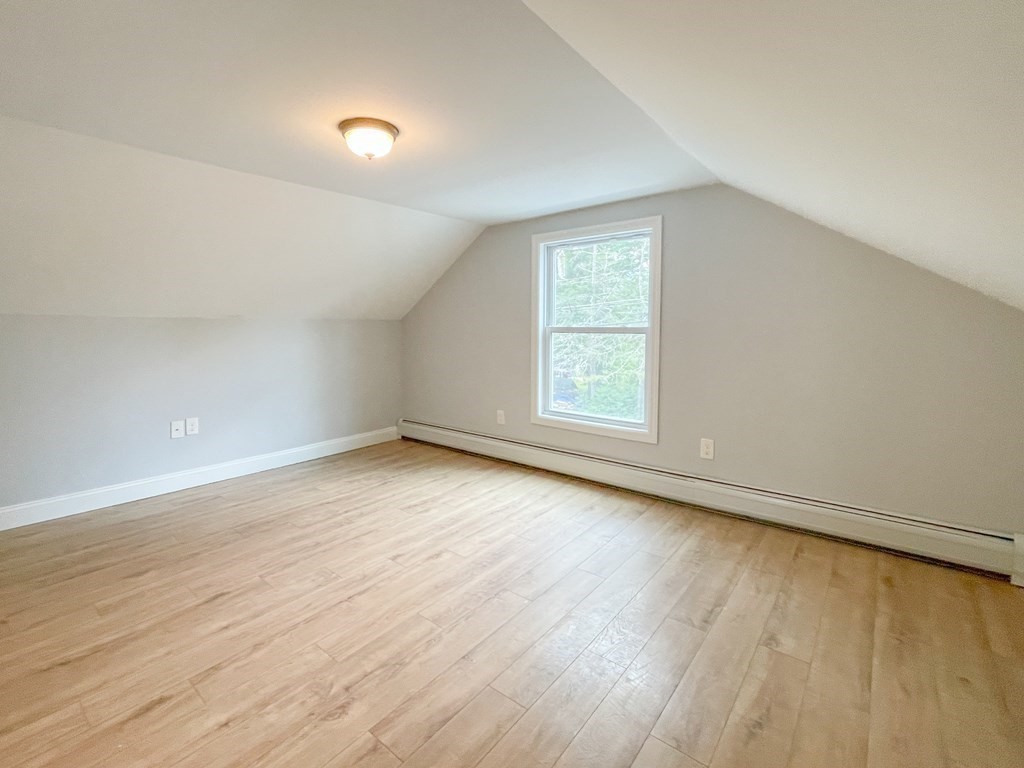 51 School Street North Barre, MA 01005 - Photo 14 of 35 an empty room with wooden floor and windows
