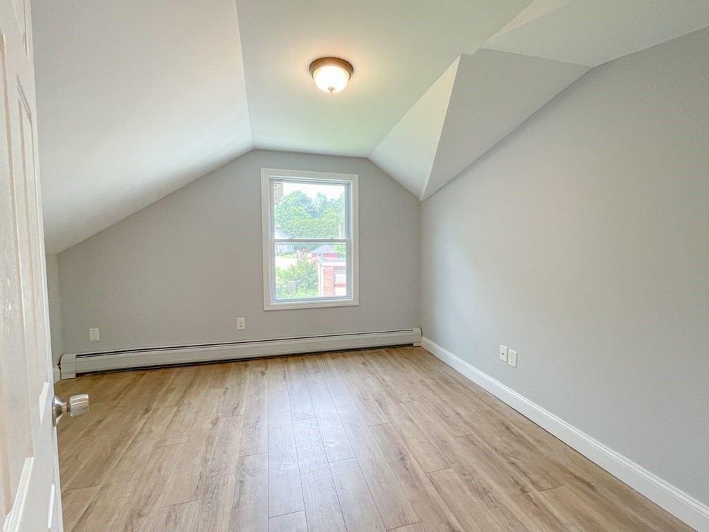 51 School Street North Barre, MA 01005 - Photo 16 of 35 an empty room with wooden floor and windows