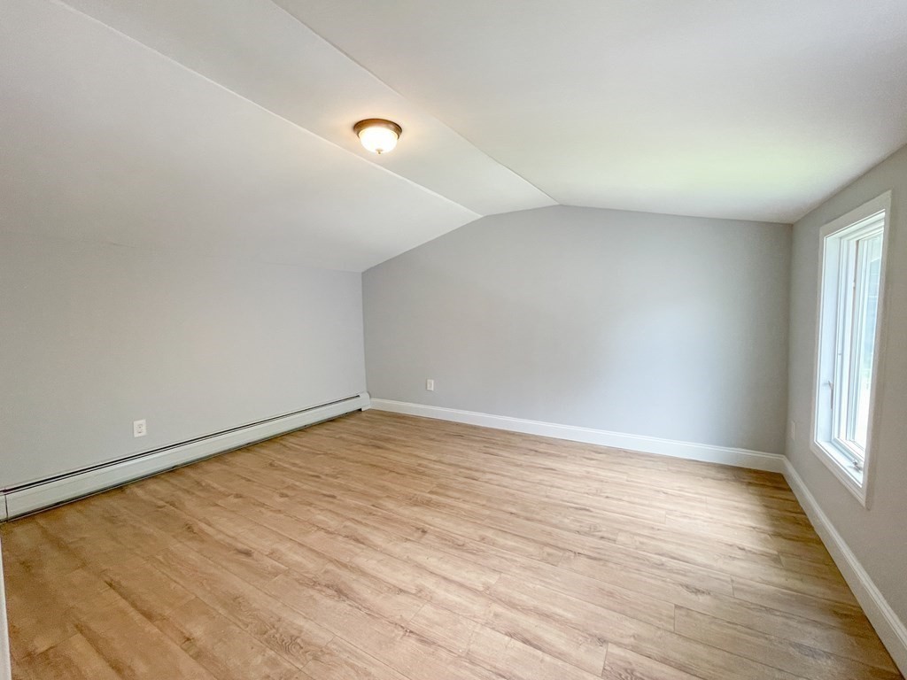 51 School Street North Barre, MA 01005 - Photo 17 of 35 wooden floor in an empty room with a window
