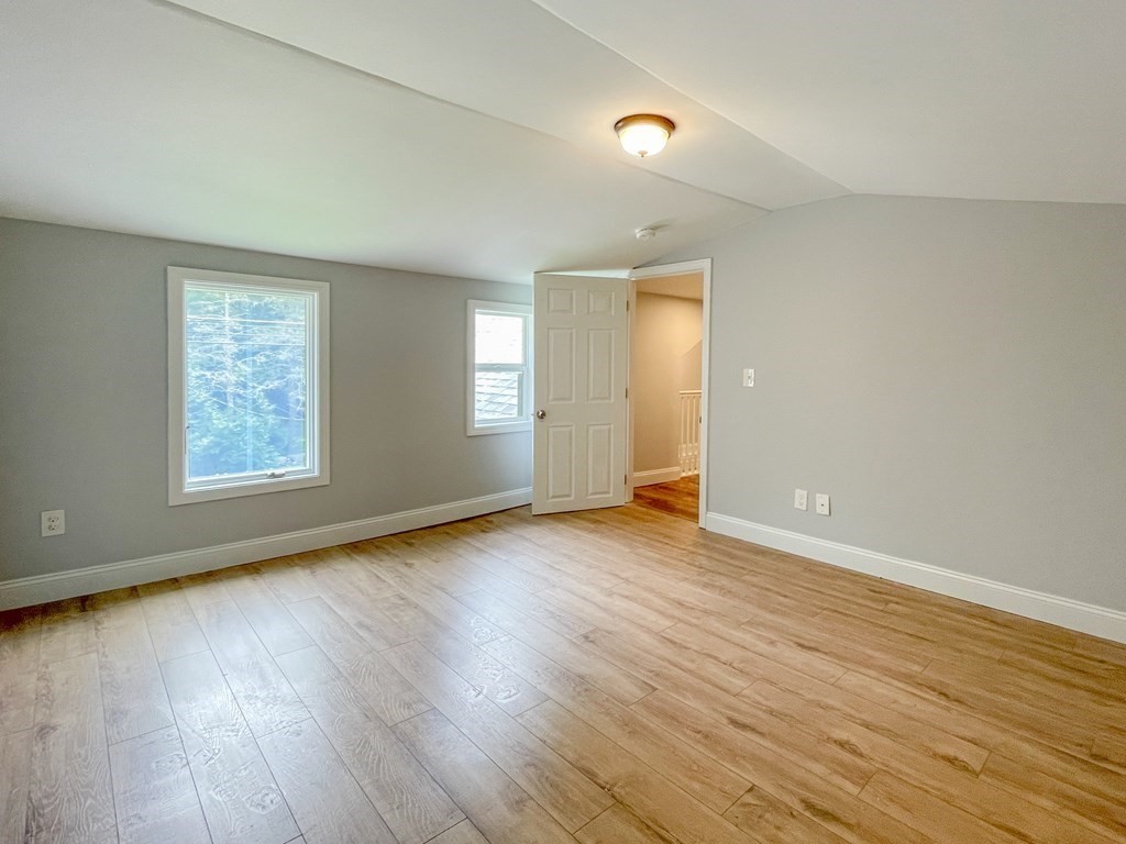 51 School Street North Barre, MA 01005 - Photo 18 of 35 an empty room with wooden floor and windows