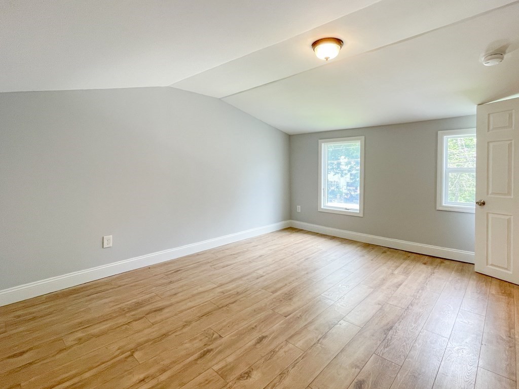 51 School Street North Barre, MA 01005 - Photo 19 of 35 an empty room with wooden floor and windows