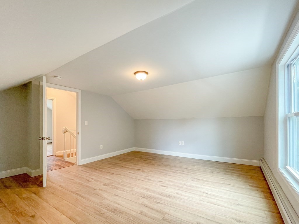 51 School Street North Barre, MA 01005 - Photo 23 of 35 an empty room with wooden floor and windows