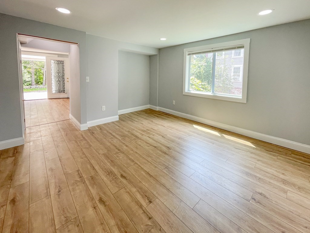 51 School Street North Barre, MA 01005 - Photo 29 of 35 an empty room with wooden floor and windows