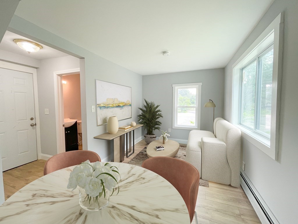 51 School Street North Barre, MA 01005 - Photo 5 of 35 a bedroom with a bed and a large window