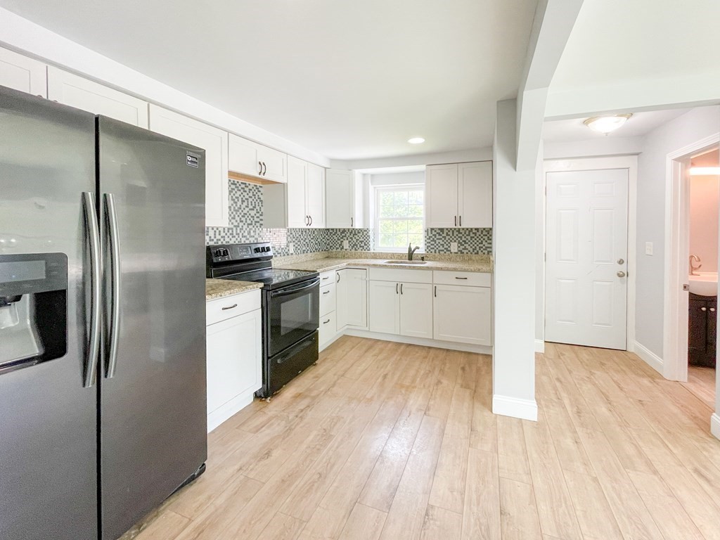 51 School Street North Barre, MA 01005 - Photo 6 of 35 a kitchen with stainless steel appliances granite countertop a refrigerator sink and microwave