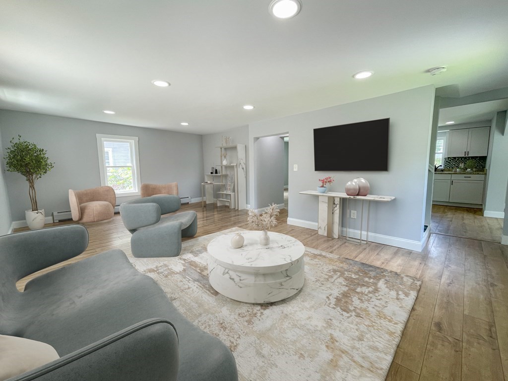 51 School Street North Barre, MA 01005 - Photo 7 of 35 a living room with furniture and a flat screen tv
