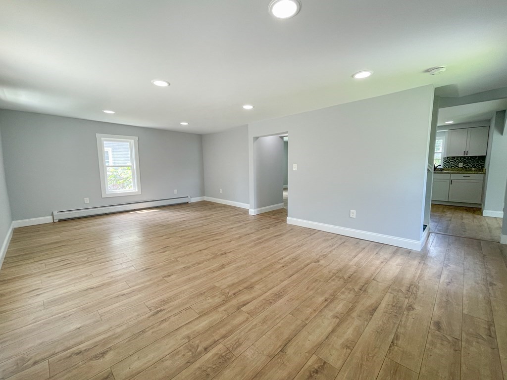 51 School Street North Barre, MA 01005 - Photo 8 of 35 an empty room with wooden floor and windows