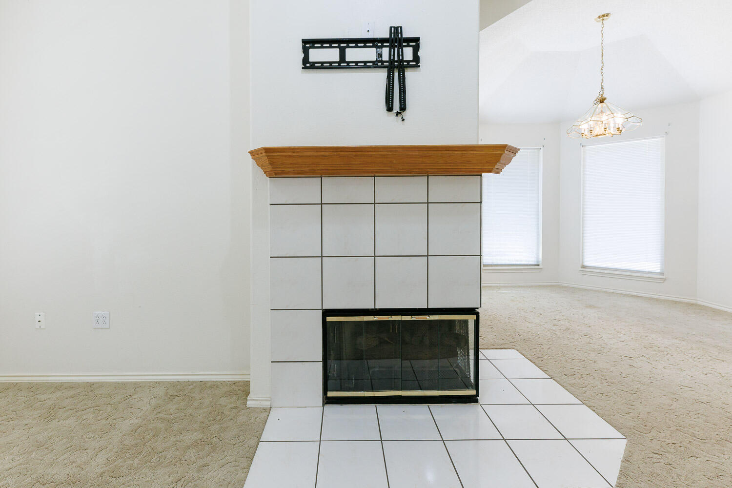 6904 Freeport Avenue Lubbock, TX 79424 - Photo 12 of 49 a living room with a fireplace