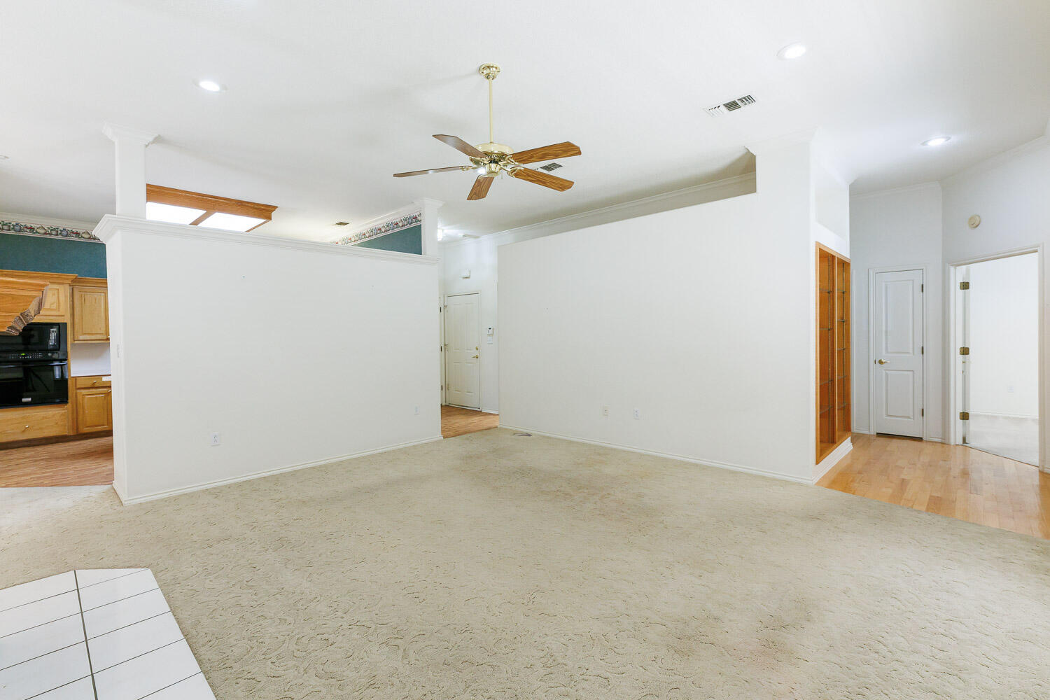 6904 Freeport Avenue Lubbock, TX 79424 - Photo 13 of 49 an empty room and chandelier fan
