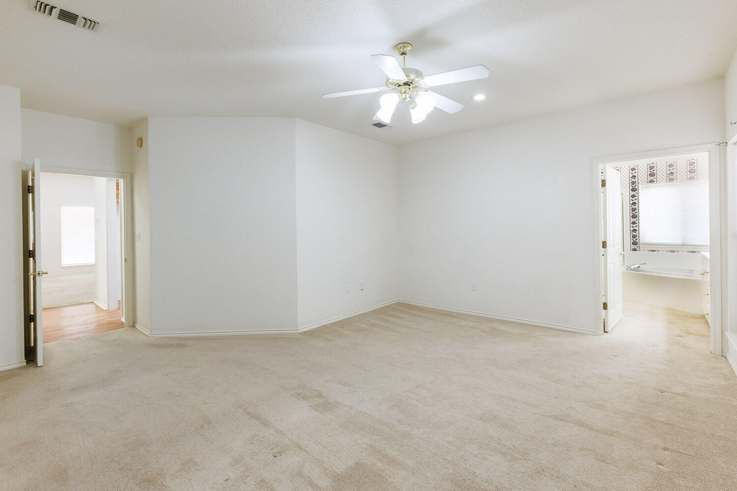 6904 Freeport Avenue Lubbock, TX 79424 - Photo 26 of 49 an empty room with a bathroom