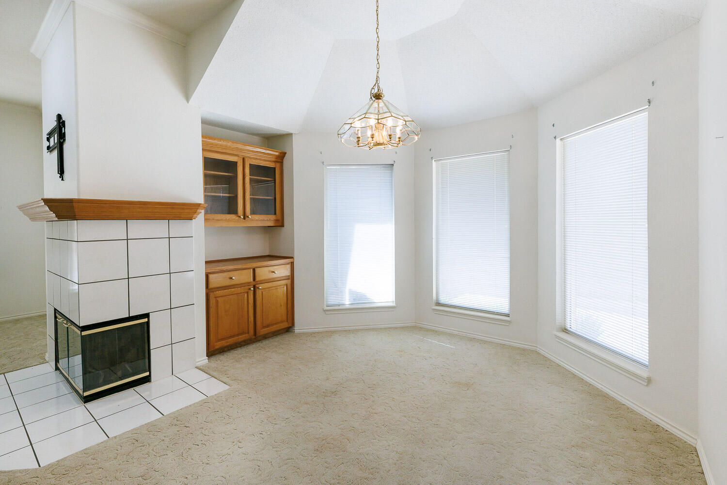 6904 Freeport Avenue Lubbock, TX 79424 - Photo 3 of 49 a view of a kitchen with microwave and stove
