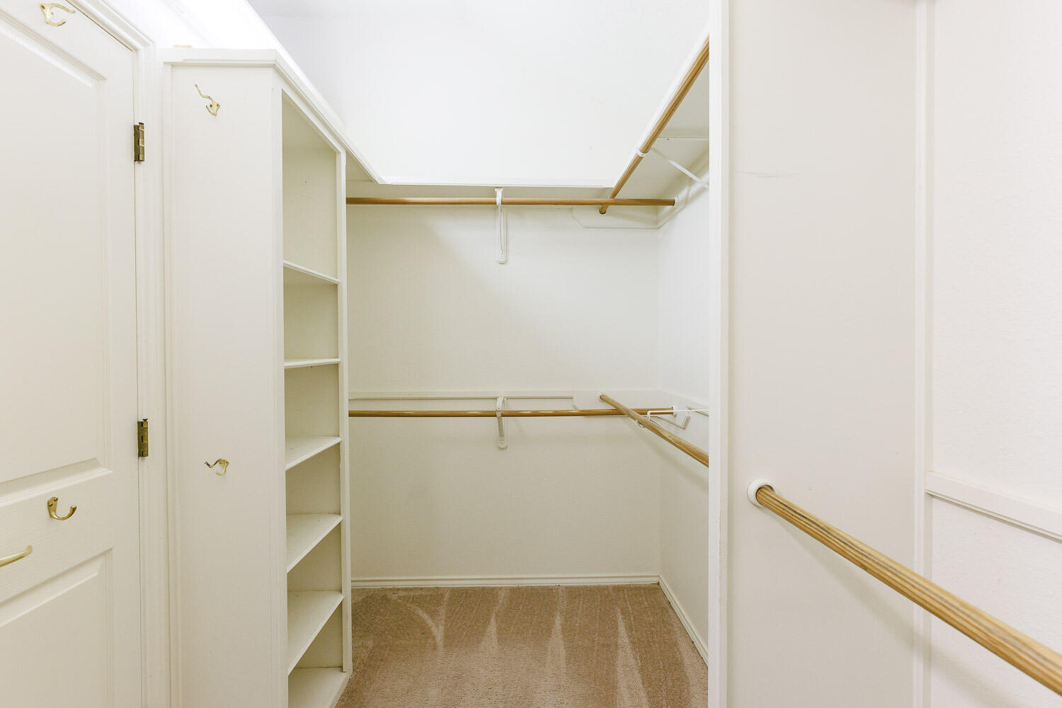 6904 Freeport Avenue Lubbock, TX 79424 - Photo 34 of 49 a view of walk in closet with empty racks