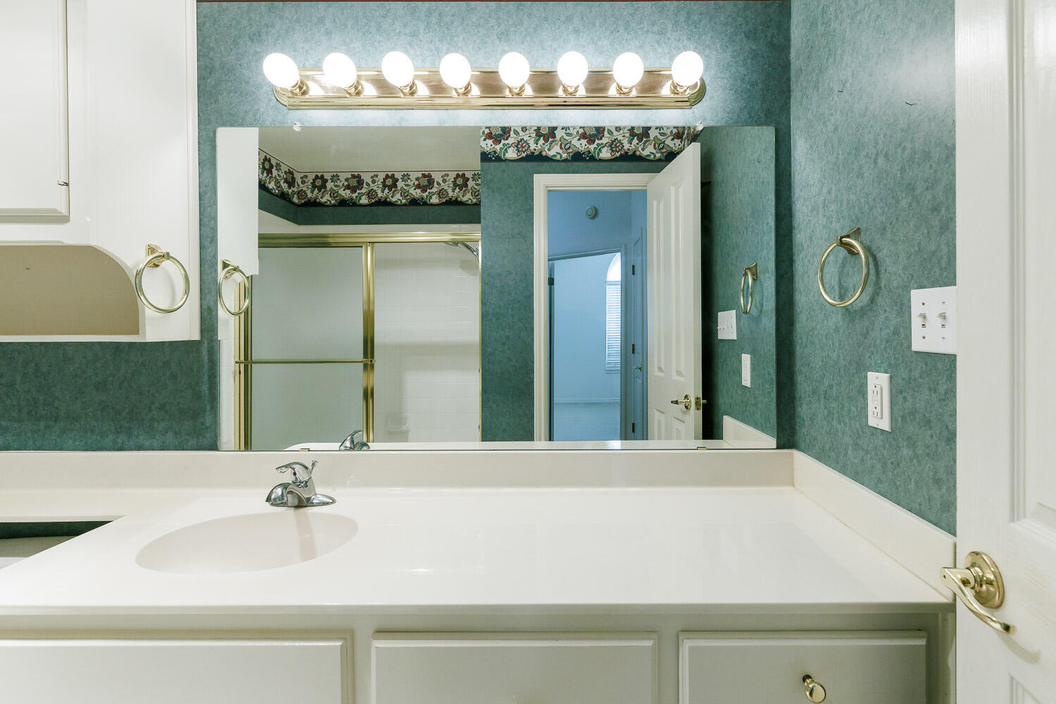 6904 Freeport Avenue Lubbock, TX 79424 - Photo 37 of 49 a bathroom with a sink and a mirror