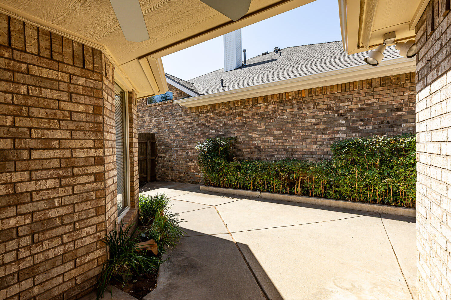 6904 Freeport Avenue Lubbock, TX 79424 - Photo 45 of 49 a view of a pathway along a building