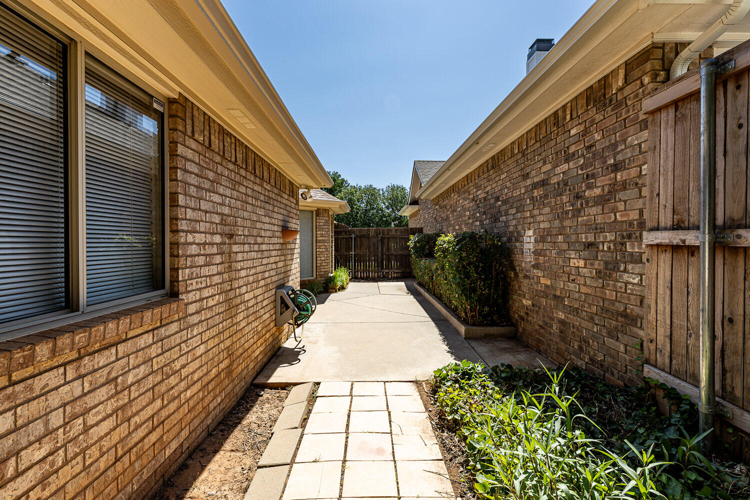 6904 Freeport Avenue Lubbock, TX 79424 - Photo 46 of 49 a pathway of a house with backyard