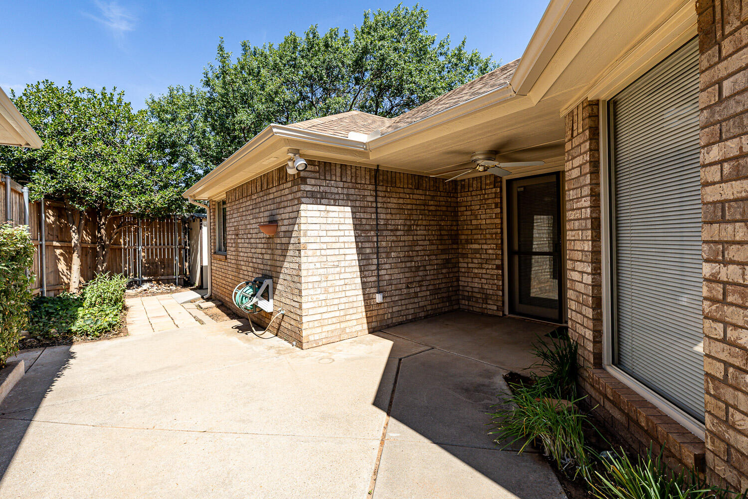 6904 Freeport Avenue Lubbock, TX 79424 - Photo 5 of 49 a view of a house with a yard and potted plants