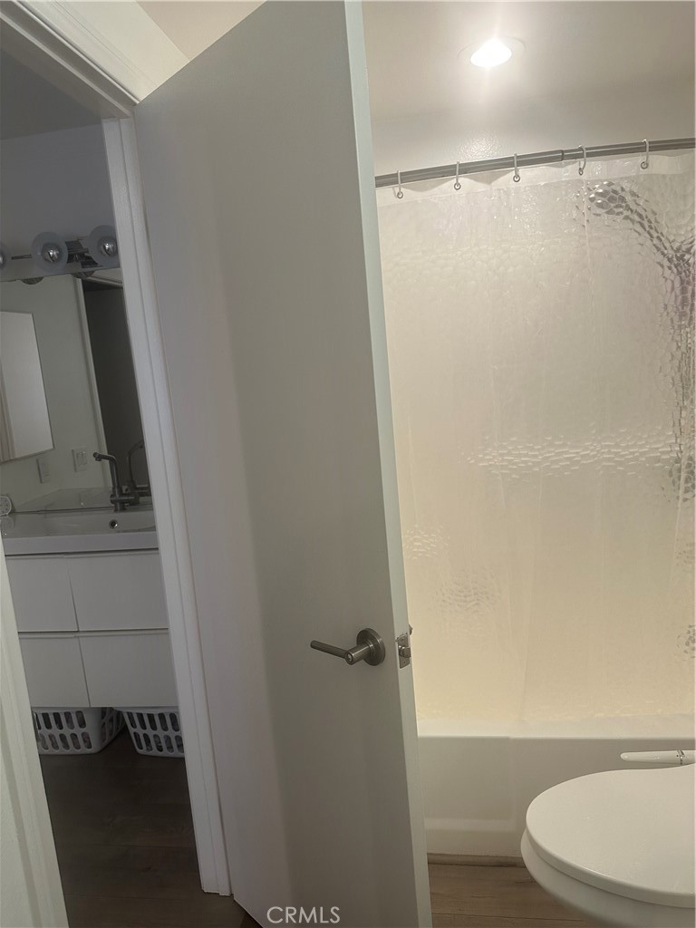 29 Woodleaf Irvine, CA 92614 - Photo 16 of 23 a bathroom with a white toilet and a shower