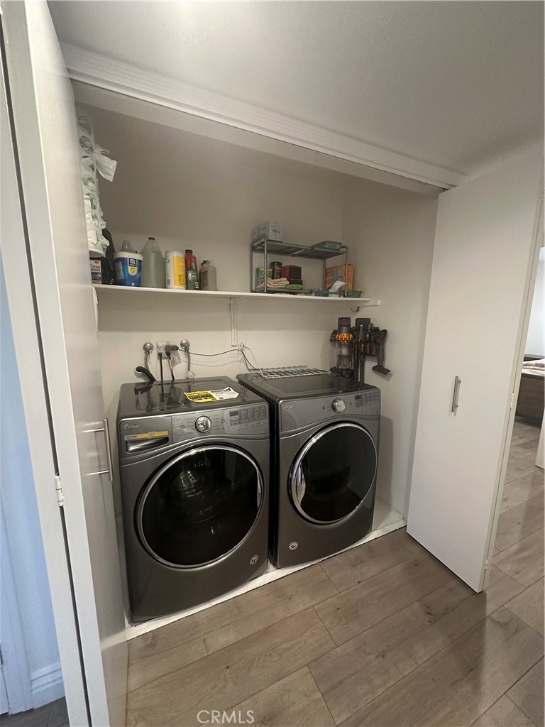 29 Woodleaf Irvine, CA 92614 - Photo 23 of 23 a utility room with sink dryer and washer