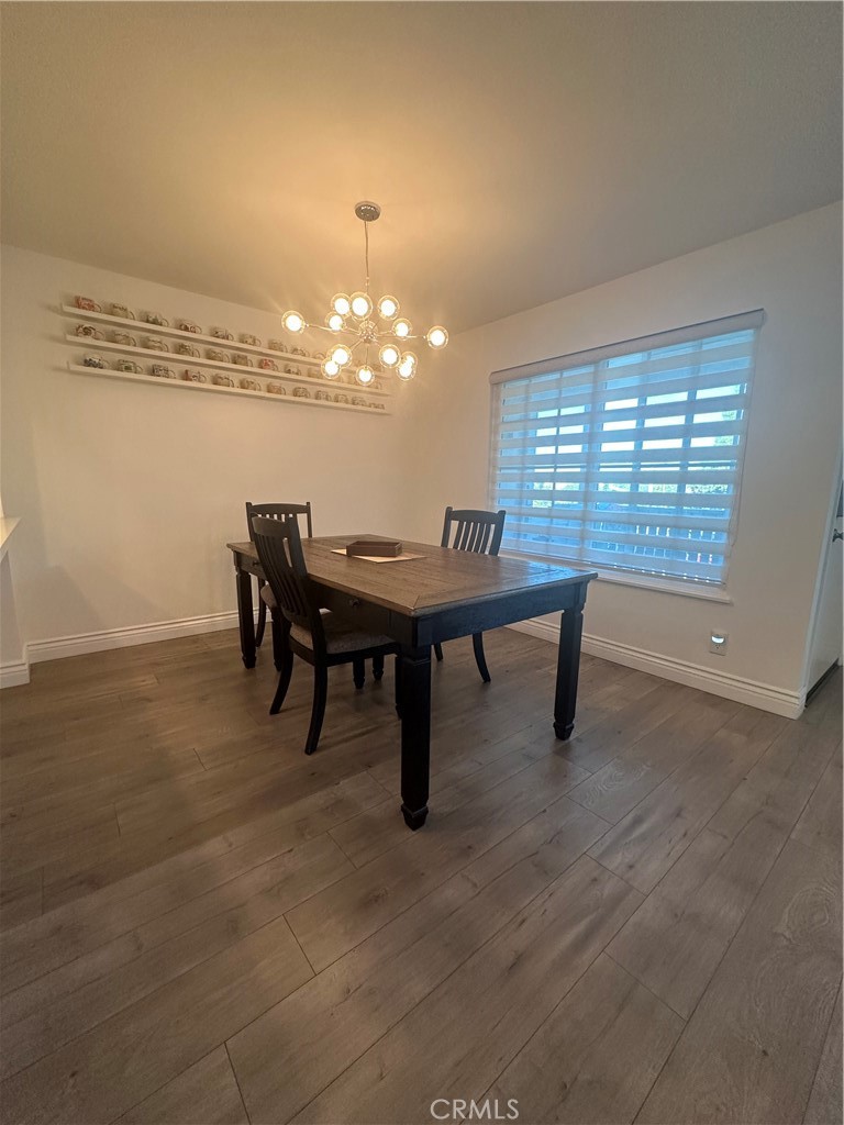 29 Woodleaf Irvine, CA 92614 - Photo 5 of 23 a view of a dining room with furniture and chandelier