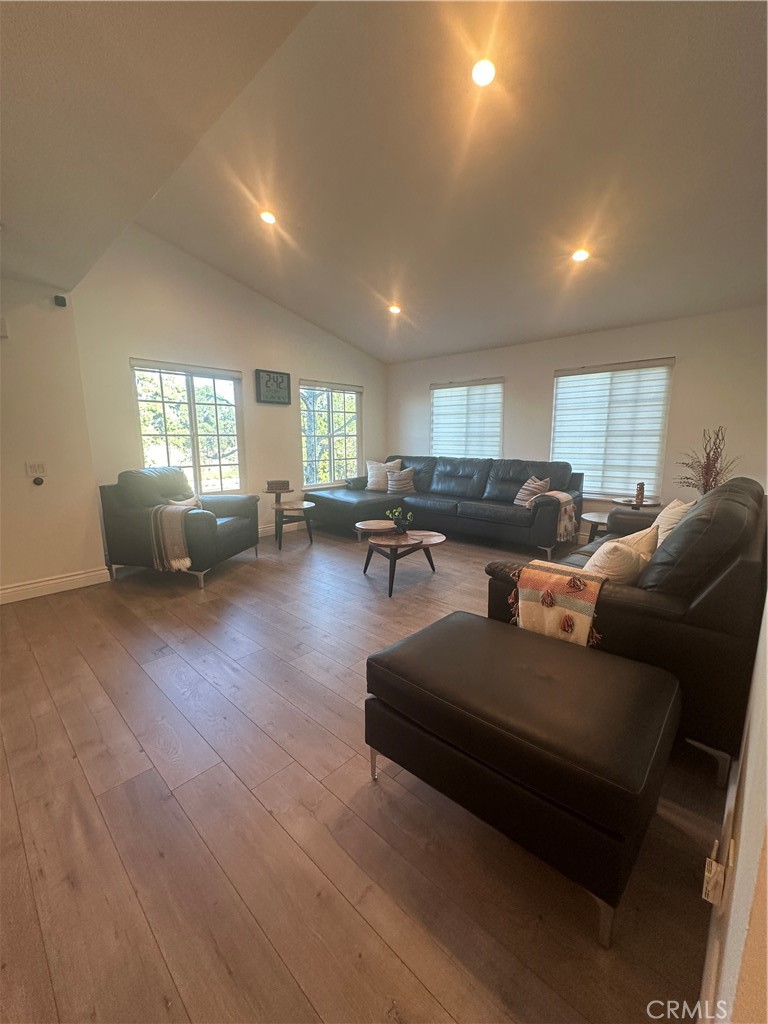 29 Woodleaf Irvine, CA 92614 - Photo 6 of 23 a living room with furniture and wooden floor