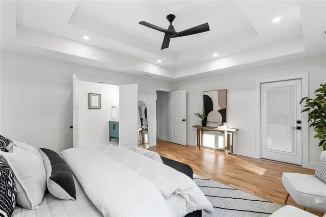 a bathroom with double vanity sinks and a mirror