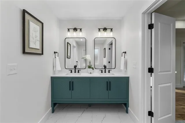 a bathroom with a bathtub and shower