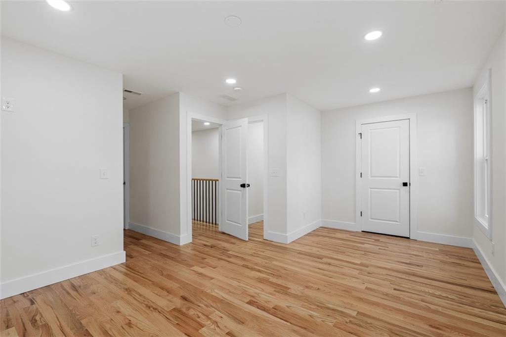 1883 Bennett Ridge Southwest Snellville, GA 30078 - Photo 43 of 56 a view of hallway with wooden floor