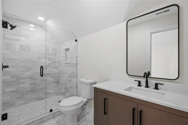 a view of a house with swimming pool and sitting area