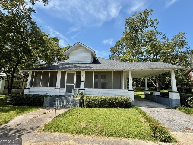450 South Rountree Street Metter, GA 30439 - Photo 16 of 17 front view of a house with a yard