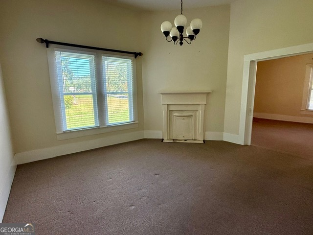 450 South Rountree Street Metter, GA 30439 - Photo 7 of 17 a view of an empty room with a window