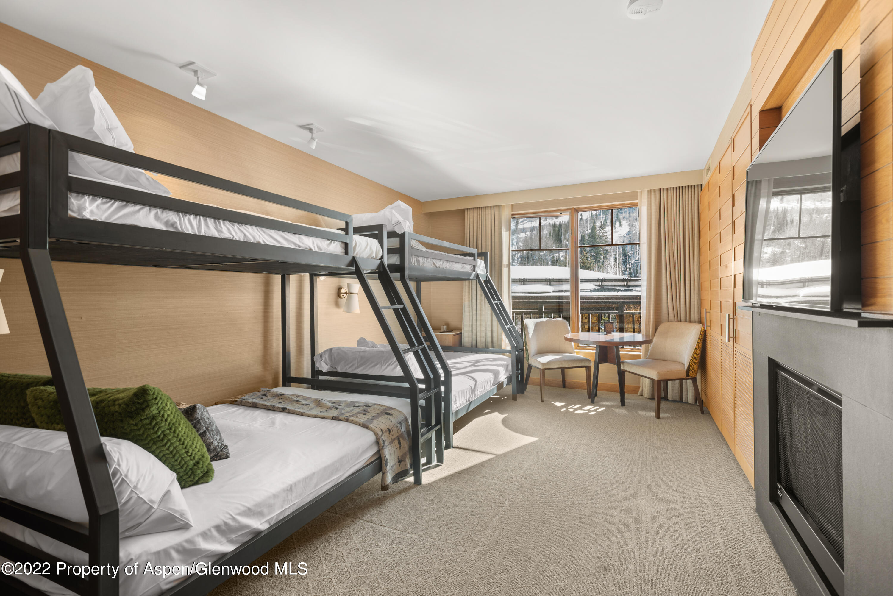 130 Wood Road, Unit 505 & 507 Snowmass Village, CO 81615 - Photo 7 of 17 a bedroom with furniture and a window