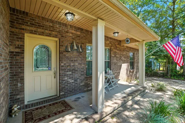 a front view of a house with a porch