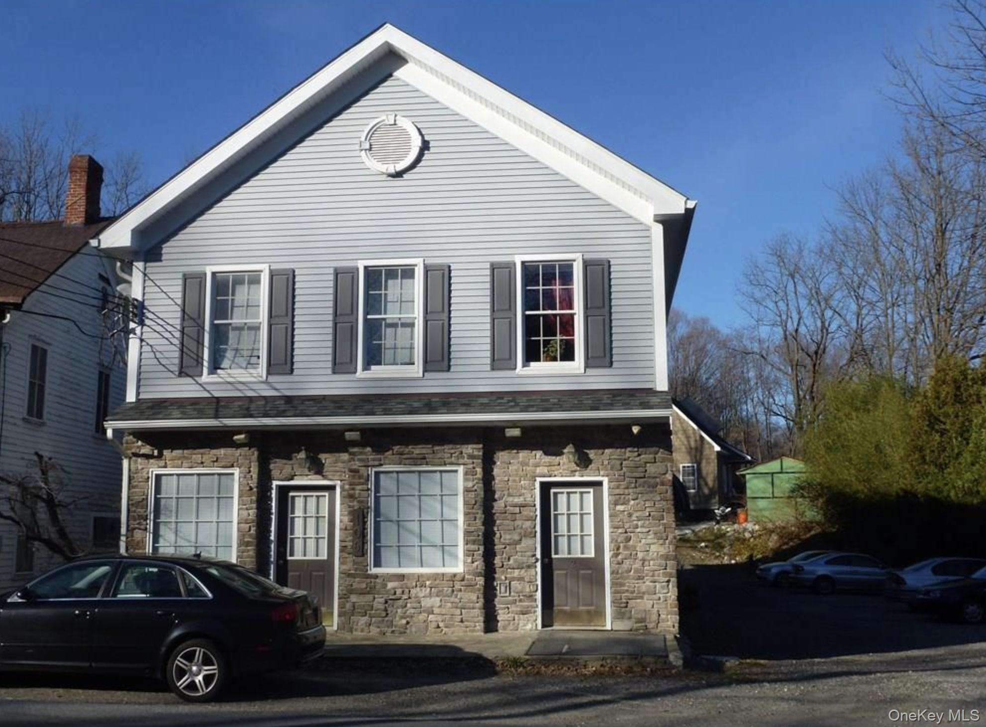 106 Newport Bridge Road, Unit 3 Warwick, NY 10990 - Photo 1 of 1 a view of a house with a porch