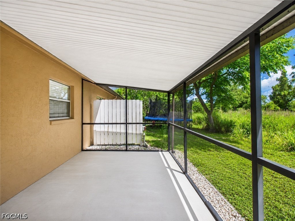 18541 Iris Road Fort Myers, FL 33967 - Photo 15 of 18 a view of swimming pool with a backyard