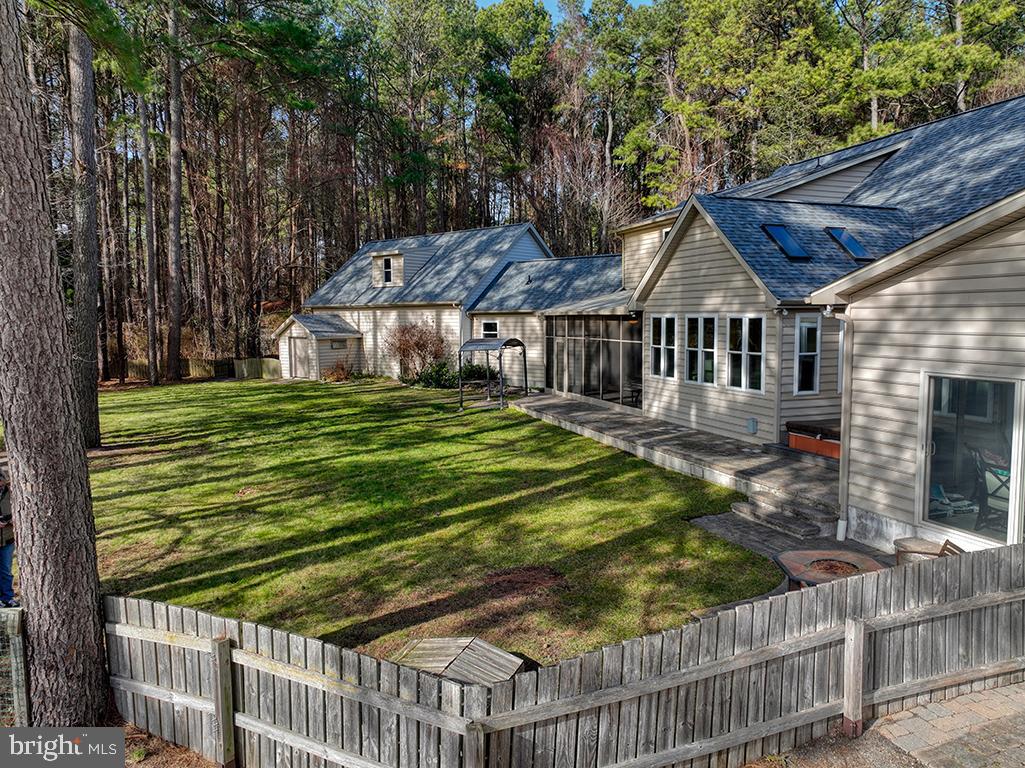 6 Cinderberry Court Georgetown, DE 19947 - Photo 104 of 117 a view of a house with a small yard and wooden fence