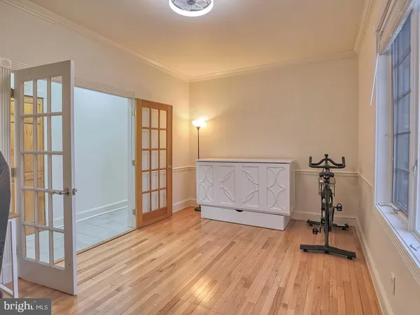 a view of a backyard with plants and a patio