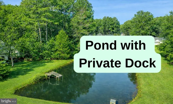 a kitchen with a sink a stove and cabinets