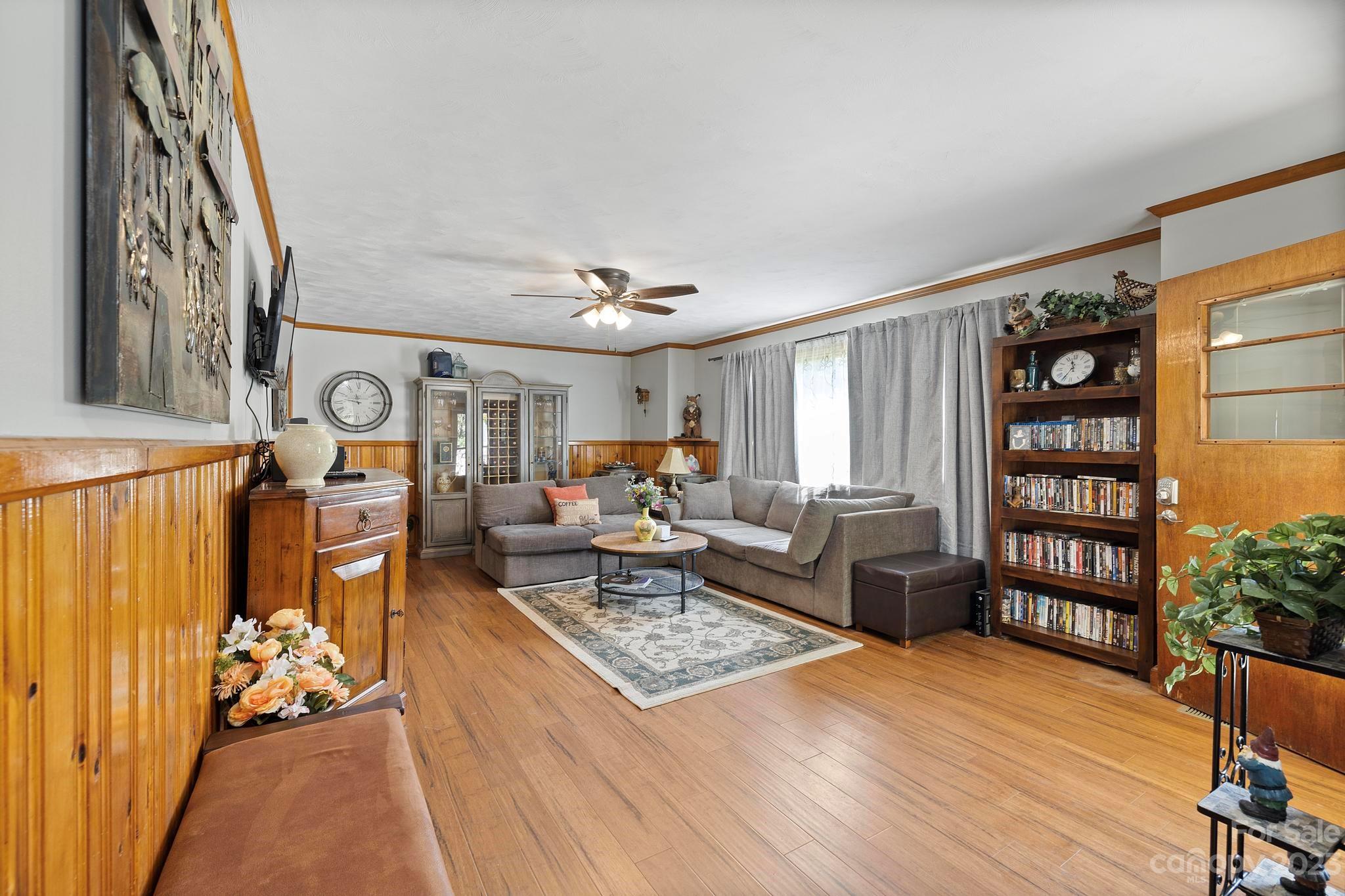 500 Indian Springs Road Clyde, NC 28721 - Photo 23 of 36 a living room with furniture and a window