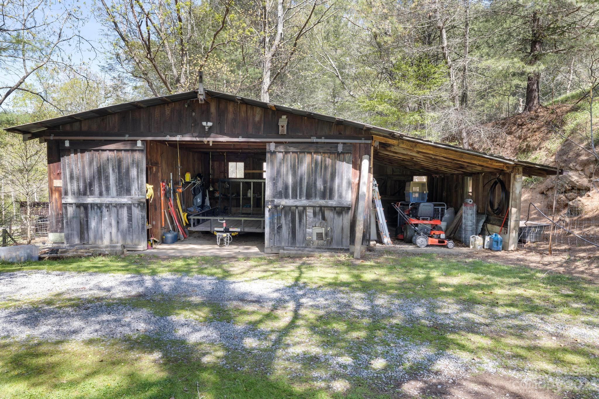 500 Indian Springs Road Clyde, NC 28721 - Photo 26 of 36 a view of a car park in front of a house