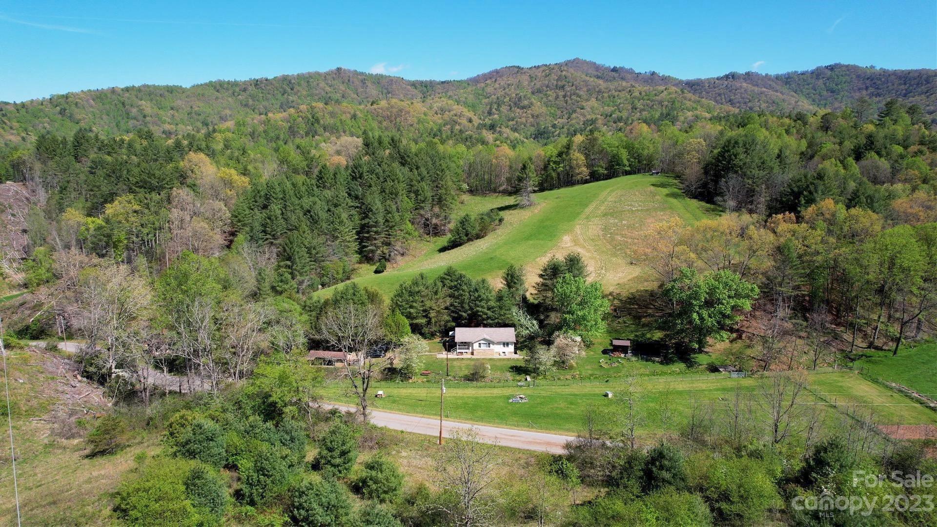 500 Indian Springs Road Clyde, NC 28721 - Photo 34 of 36 an aerial view of a house with mountain view