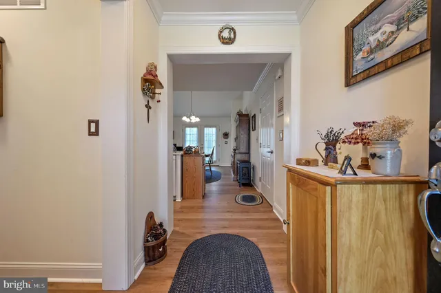 a view of a living room with a baby crib