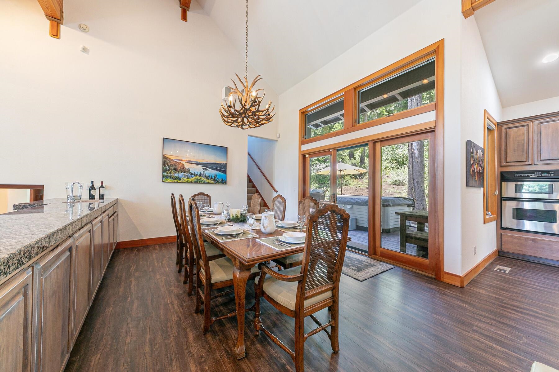 1141 Snow Crest Road Alpine Meadows, CA 96146 - Photo 13 of 27 a view of a dining room with furniture window and wooden floor