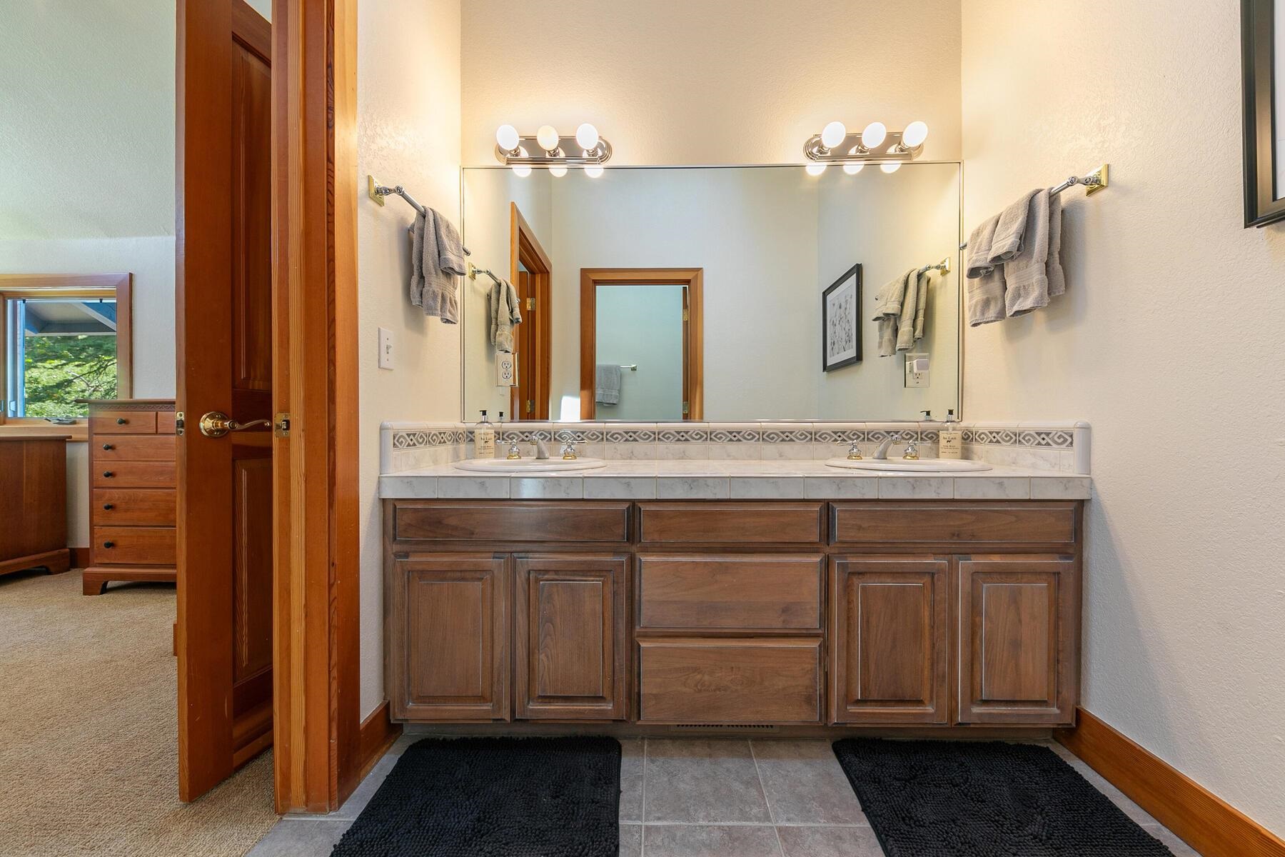 1141 Snow Crest Road Alpine Meadows, CA 96146 - Photo 16 of 27 a bathroom with a sink and a mirror