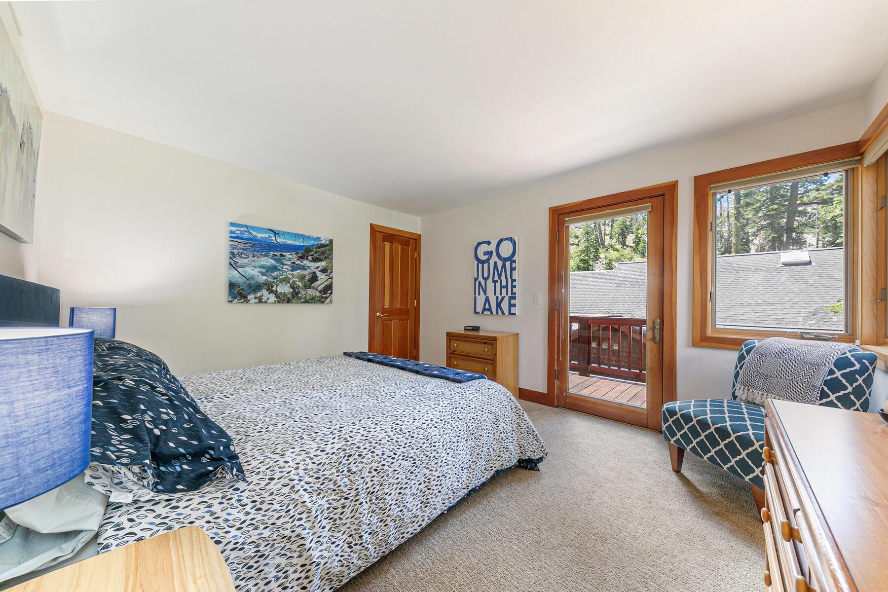 1141 Snow Crest Road Alpine Meadows, CA 96146 - Photo 17 of 27 a bedroom with a bed dresser and a couch