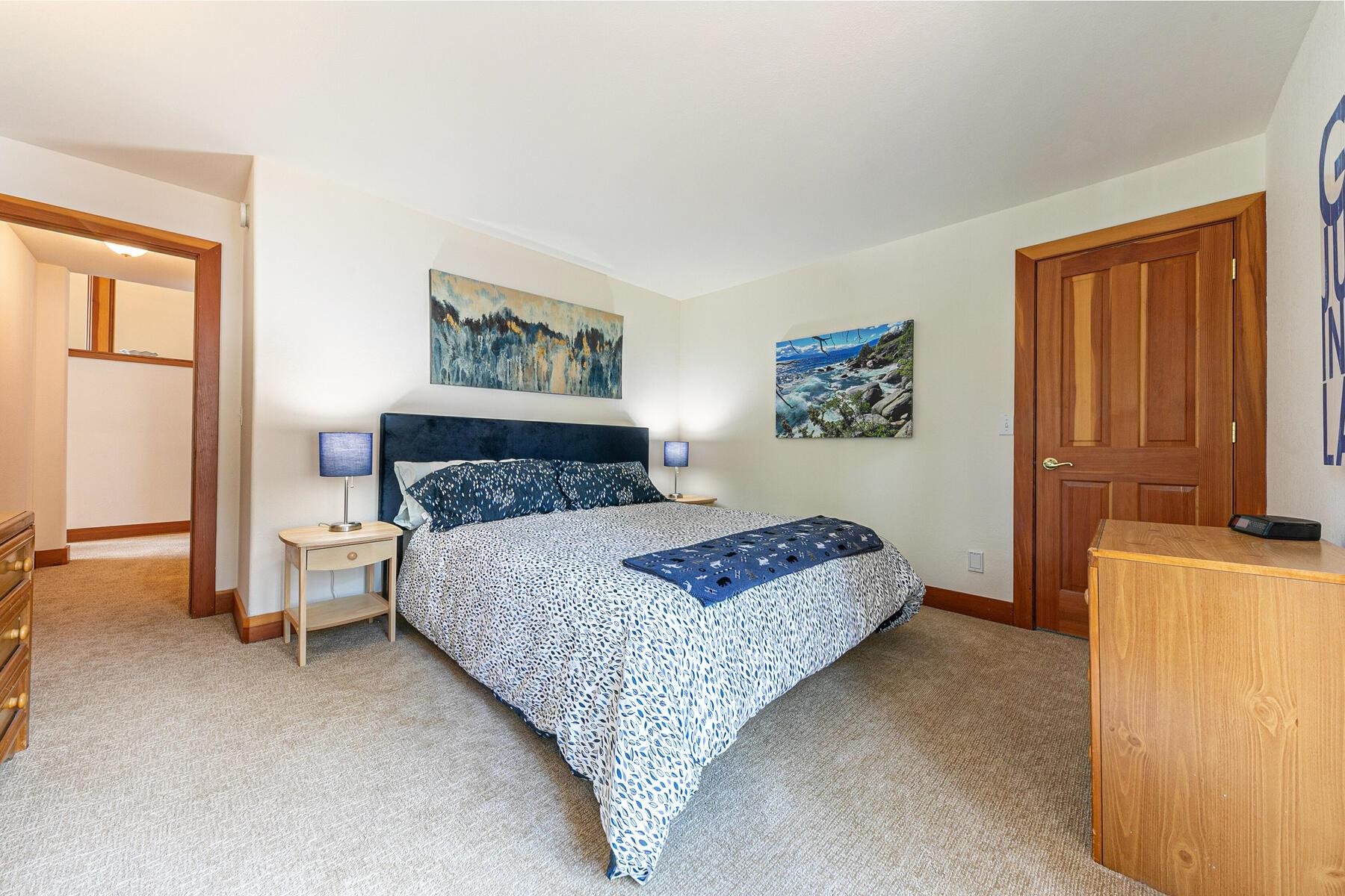 1141 Snow Crest Road Alpine Meadows, CA 96146 - Photo 18 of 27 a bedroom with a bed and a painting on the wall