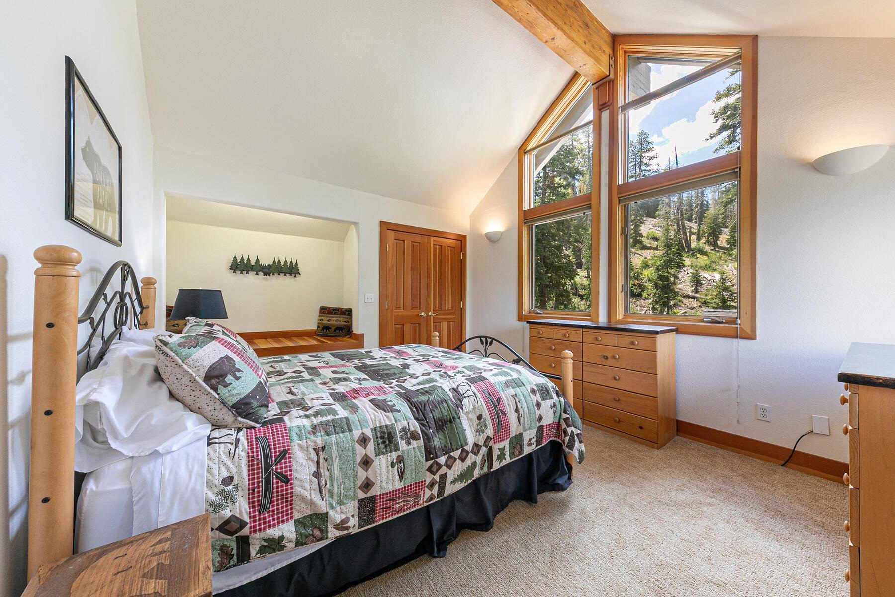 1141 Snow Crest Road Alpine Meadows, CA 96146 - Photo 20 of 27 a bedroom with a bed and a window