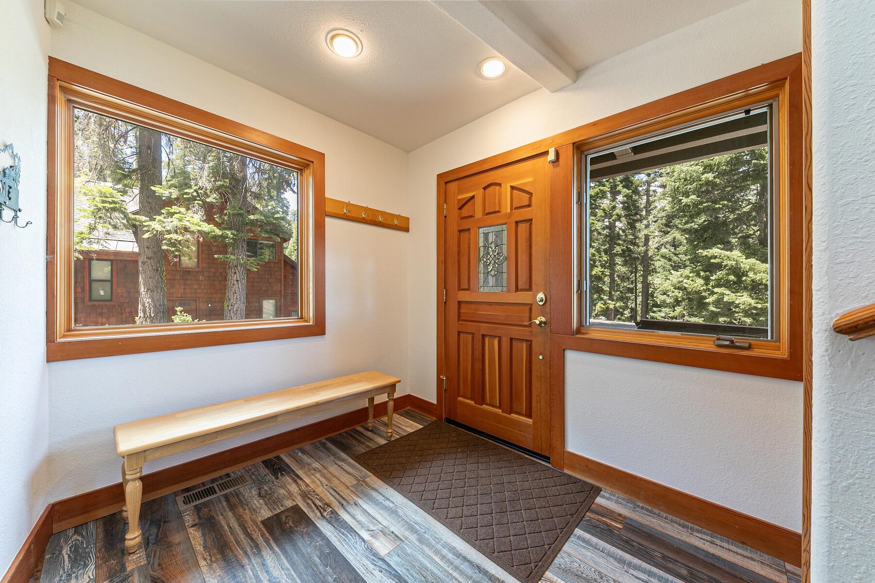 1141 Snow Crest Road Alpine Meadows, CA 96146 - Photo 23 of 27 a bedroom with wooden floor and a window