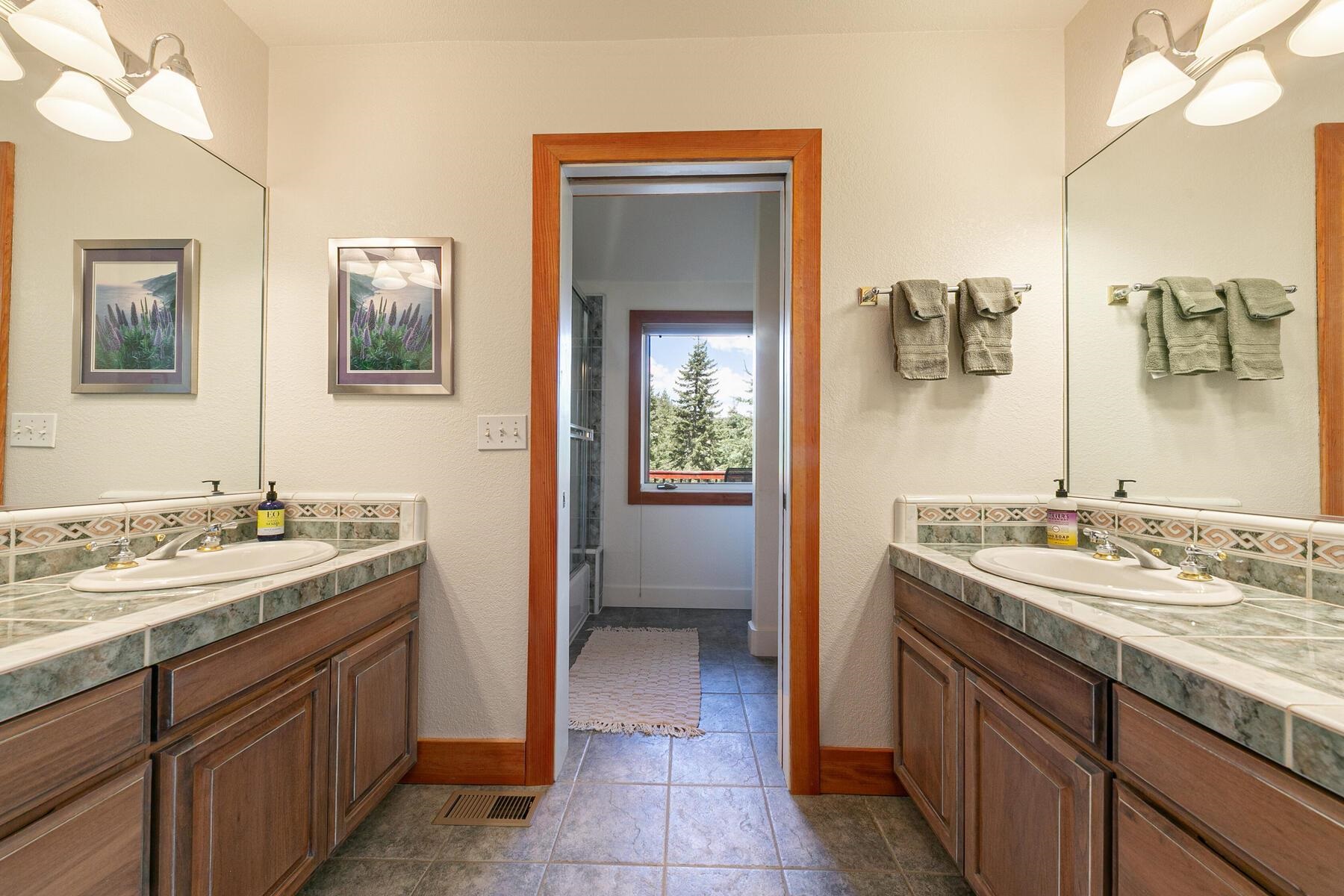 1141 Snow Crest Road Alpine Meadows, CA 96146 - Photo 24 of 27 a bathroom with a sink and a mirror