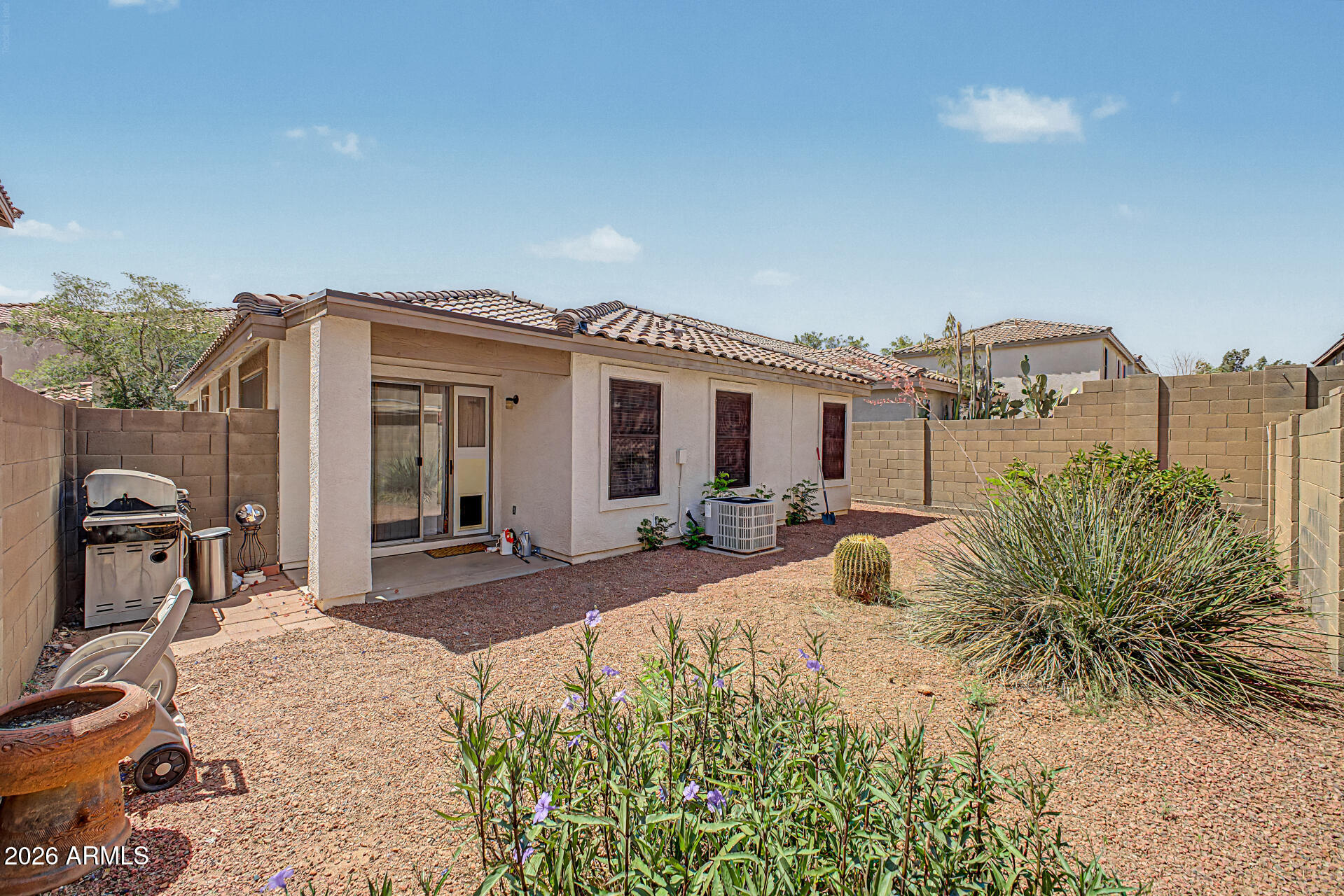 3489 South Bowman Road Apache Junction, AZ 85119 - Photo 23 of 24 a view of a house with backyard and sitting area