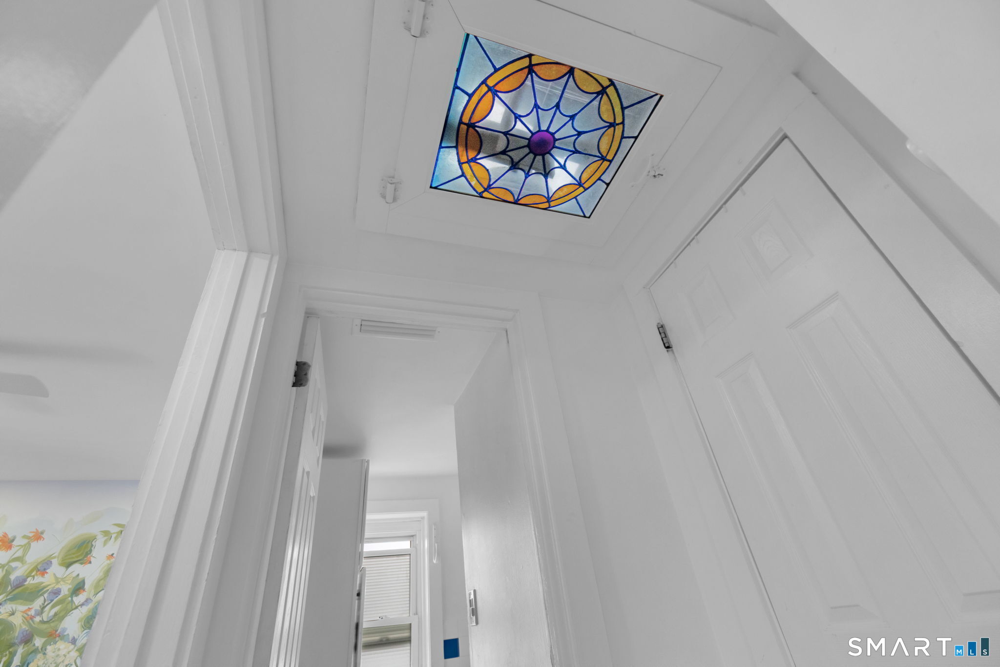 510 Reef Road Fairfield, CT 06824 - Photo 17 of 31 a picture of a bathroom with a picture on the wall